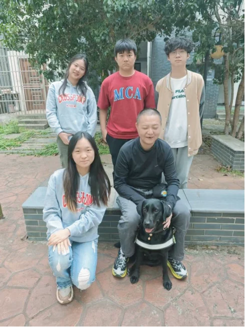 A community visit during the guide-dog project